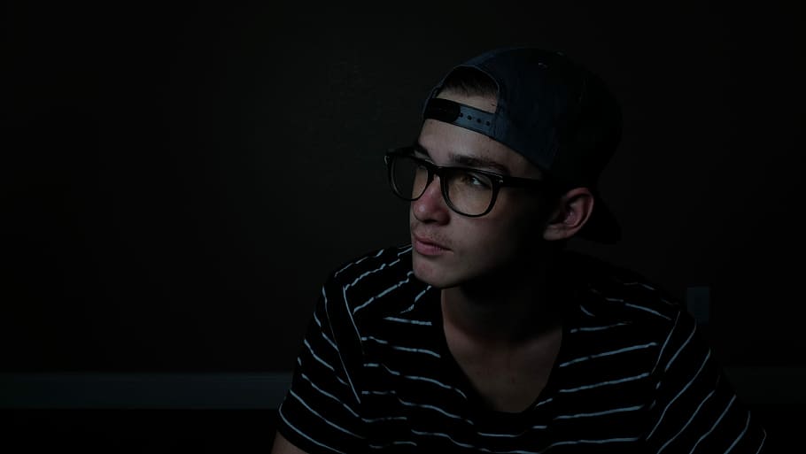 man wearing black and white striped crew-neck shirt, man wearing black and white striped shirt and black cap HD wallpaper