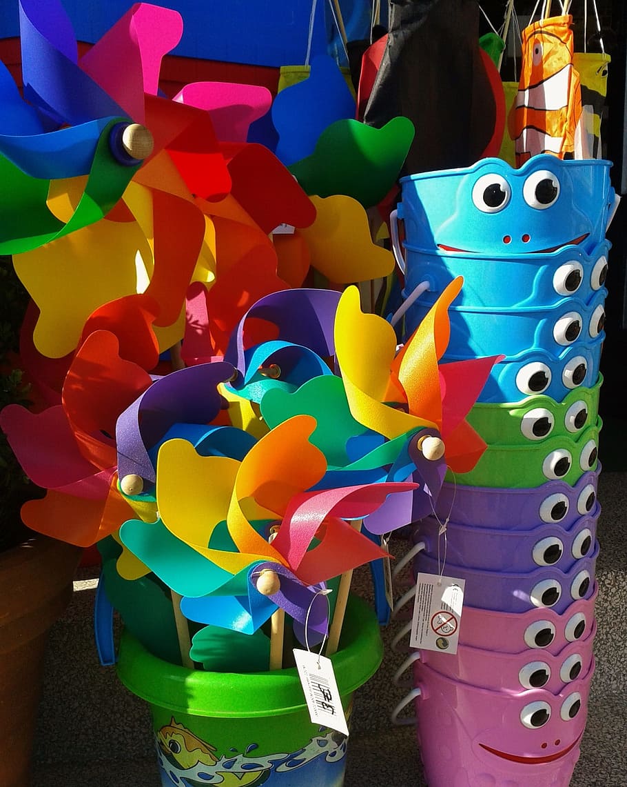 assorted plastic bucket lot, windräder, pinwheel, turn, colorful