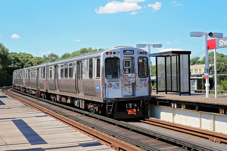 silver train near station, train traveling along railway near waiting shed HD wallpaper