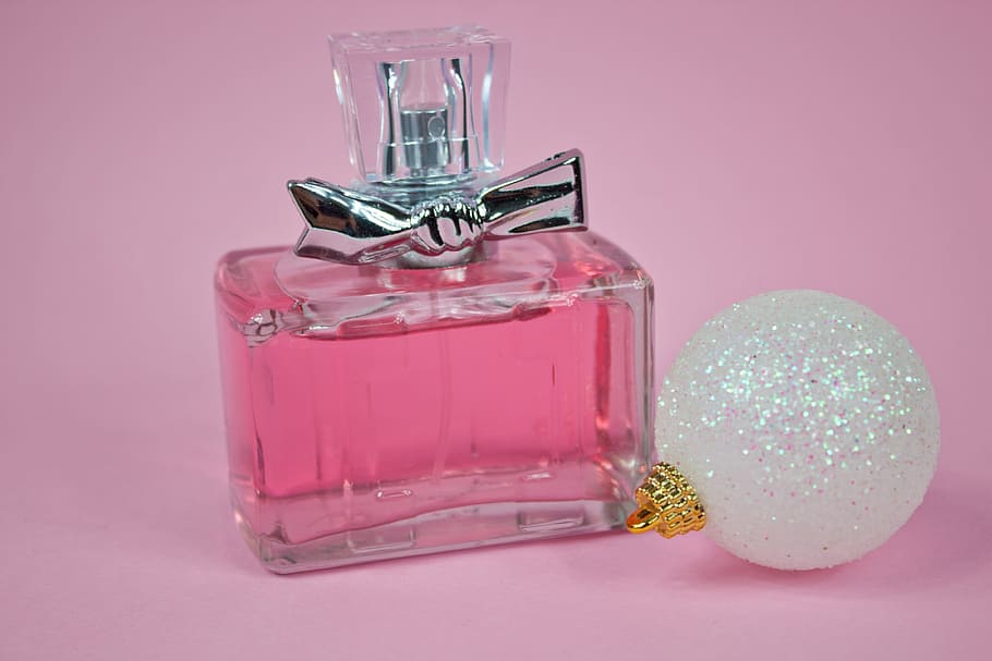 clear glass perfume bottle beside white bauble, Pink, Beautiful