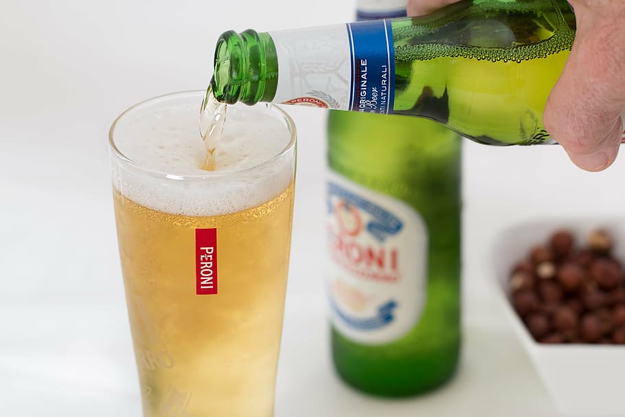 person pouring liquor on clear glass, beer, refreshing, drink HD wallpaper