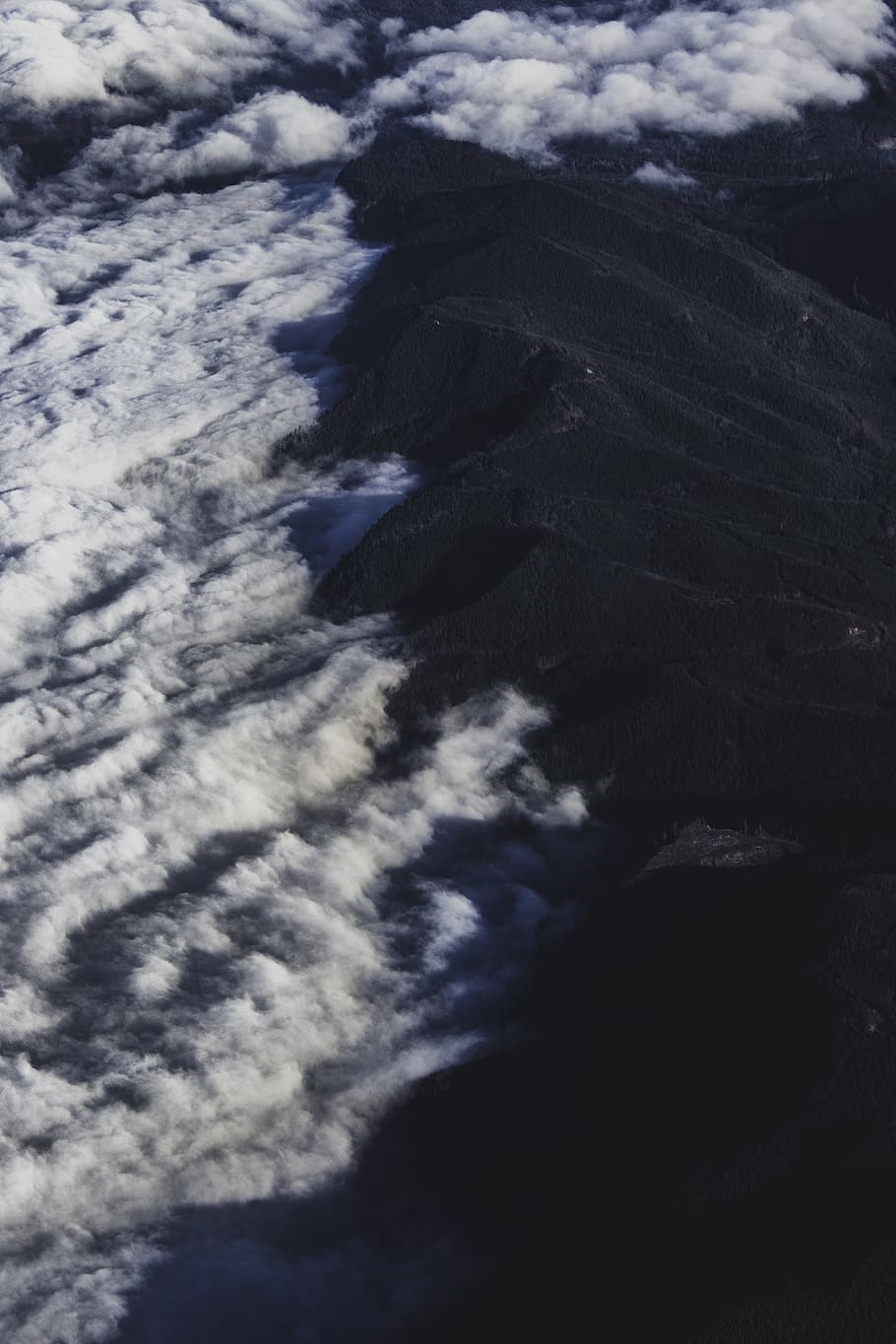 white clouds on black mountain, bird's eye photo of mountain and sea cloud HD wallpaper