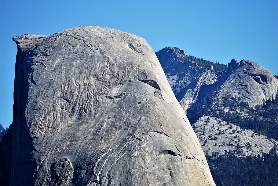 rocky mountain ranges, grey rock across trees, boulder, granite HD wallpaper