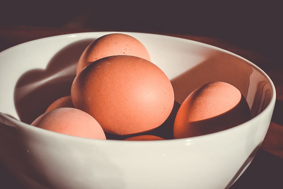 raw eggs on bowl, brown egg on white ceramic bowl, orange, shadow HD wallpaper
