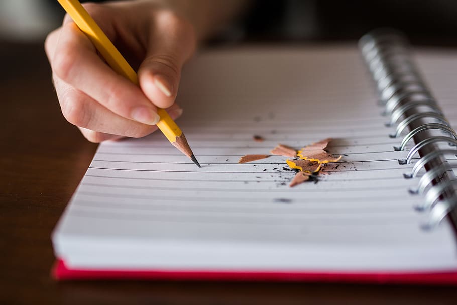 person writing in ruled paper, notebook, pencil, write, school HD wallpaper