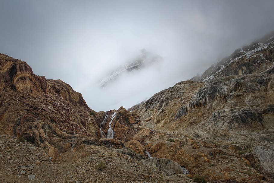 landscape photography of mountain during daytime, photography of mountain surrounded by mist HD wallpaper