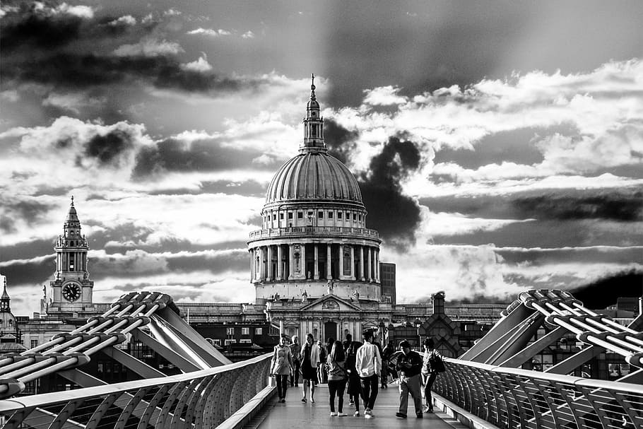 grayscale photo of people near on cathedral, st paul's cathedral