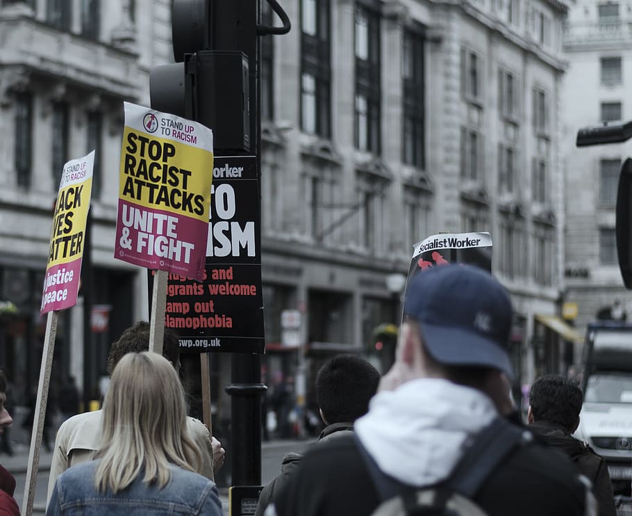 shallow focus photo of protesting people, people walking on street while protesting HD wallpaper