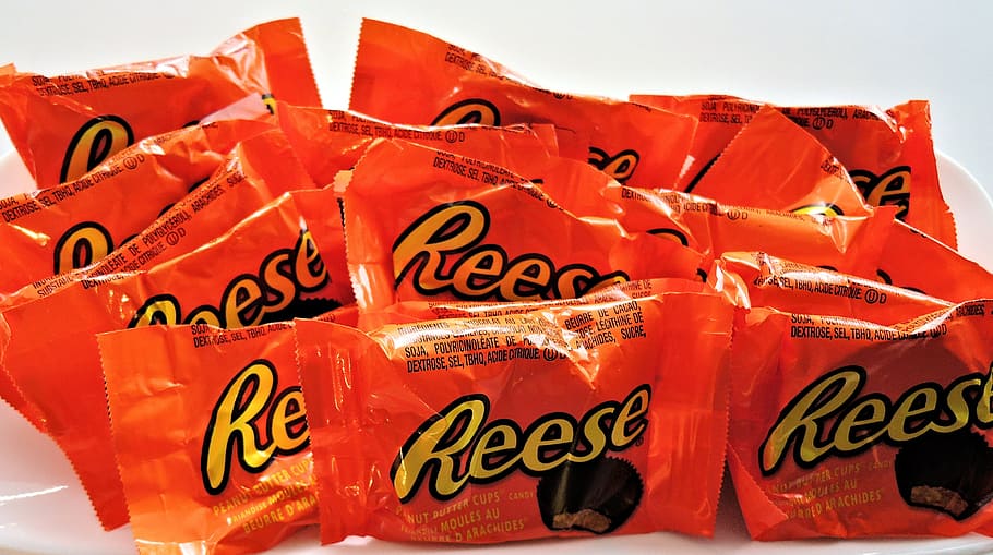 peanut butter cups, chocolate, candy, sweet, food, text, red