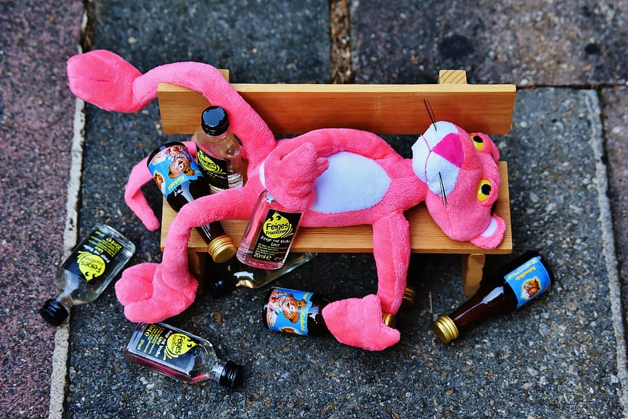 photo of Pink Panther sleeping on bench holding and surrounded by empty liquor bottles, HD wallpaper