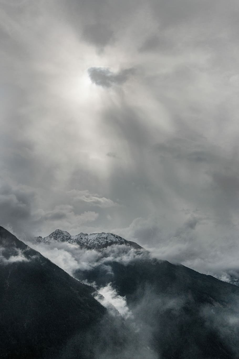 aerial view of snowy mountains under cloudy sky, mountain under clouds HD wallpaper