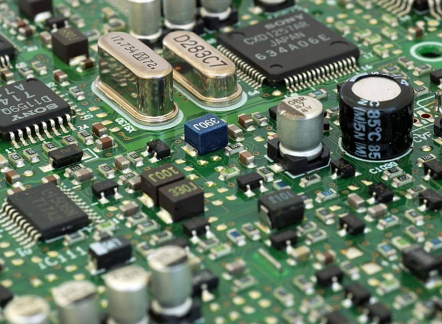 closeup photo of black resistor, circuit board, electronics, technology