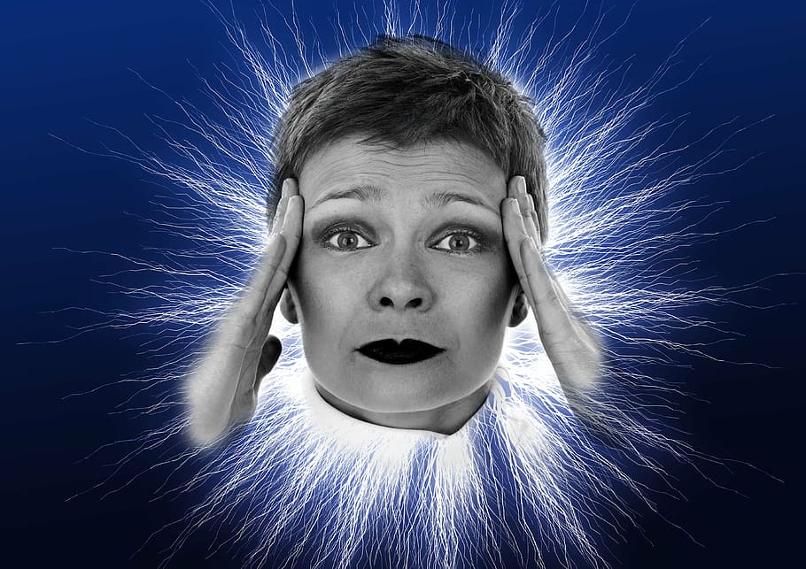 grayscale photo of woman's face, headache, flash, headaches, crisis