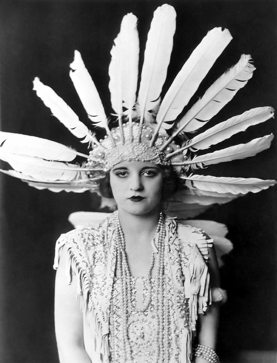grayscale photography of woman wearing feather headdress, tallulah bankhead