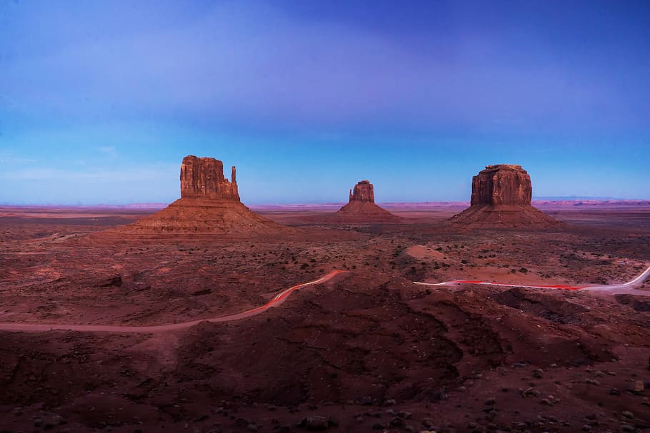 mountains under cloudy sky, desert during nighttime, monument HD wallpaper