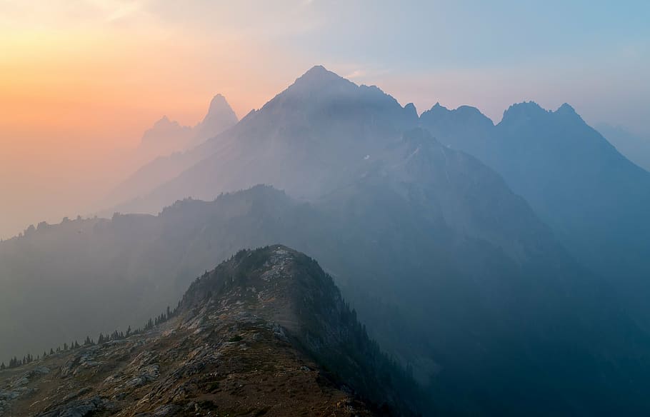 aerial photography of mountain under blue sky, covered, fog HD wallpaper