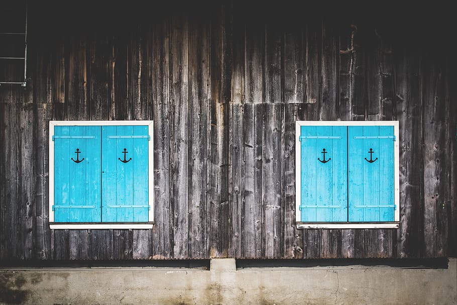 two square blue wooden doors cabinet, minimalist photography of closed wooden windows