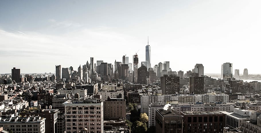 aerial photo of city under white clouds at daytime, urban Skyline HD wallpaper