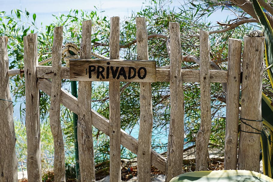 brown wooden fence near body of water, barrier, private, imprisoned
