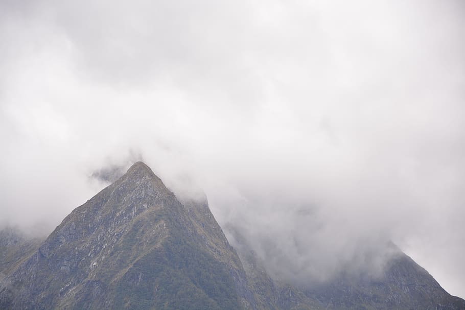 mountain view under cloudy sky during daytime, brown mountain under the smoky air HD wallpaper