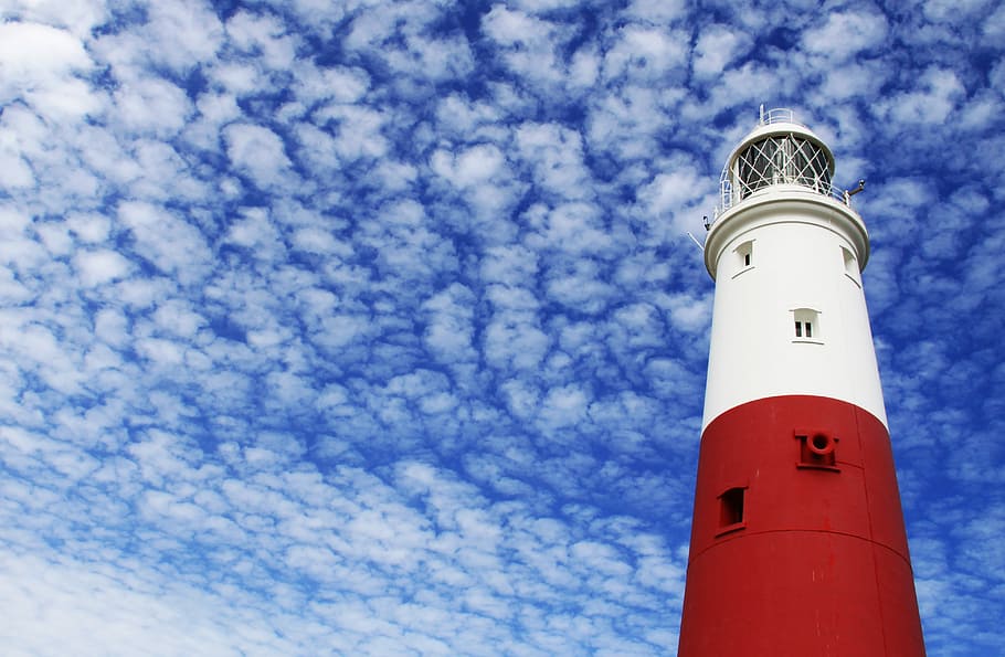 white and red lighthouse under cloudy sky, worms eye view of lighthouse during daytime HD wallpaper