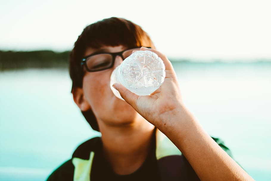 man drinking water, boy, happy, hydration, childhood, water bottle HD wallpaper