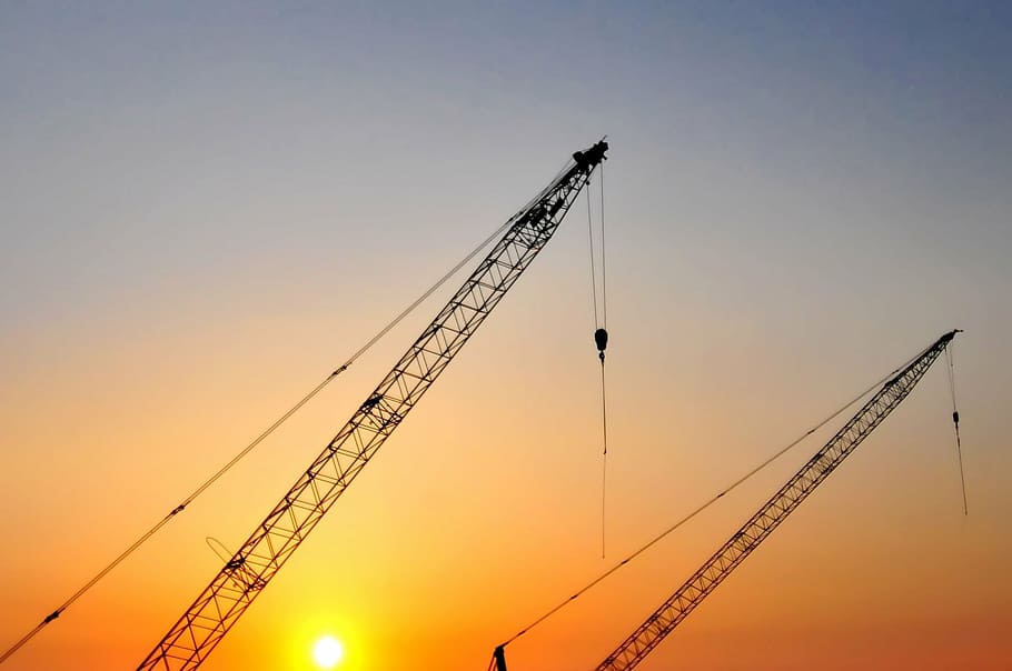 two silhouette of cranes, architecture, backlit, beginning HD wallpaper