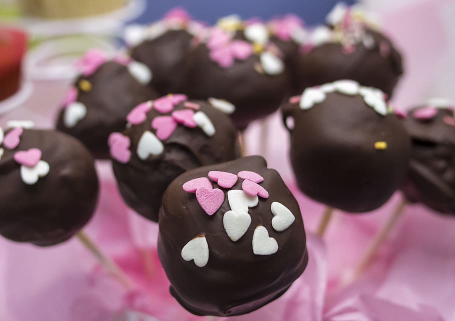 black chocolate with pink candies on top, sweet, cake, cupcake HD wallpaper