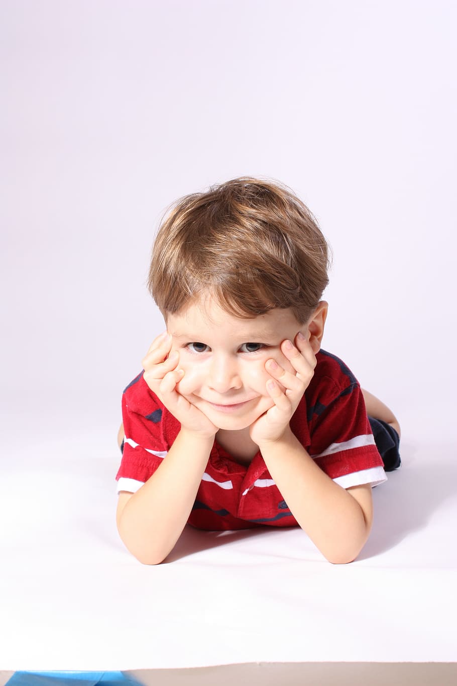 boy wearing red shirt, smiling, child, lying, down, floor, happy HD wallpaper