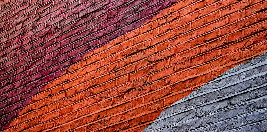low angle photography of concrete building with assorted-color paint, red, orange and gray painted brickw all HD wallpaper