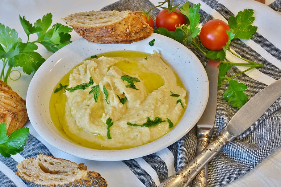 cream with bread and tomatoes, hummus, chickpeas, paste, seeds HD wallpaper