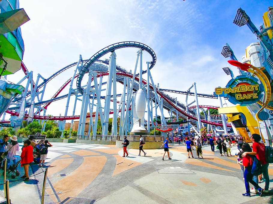 wide angle photography of people at park, theme park, rollercoaster