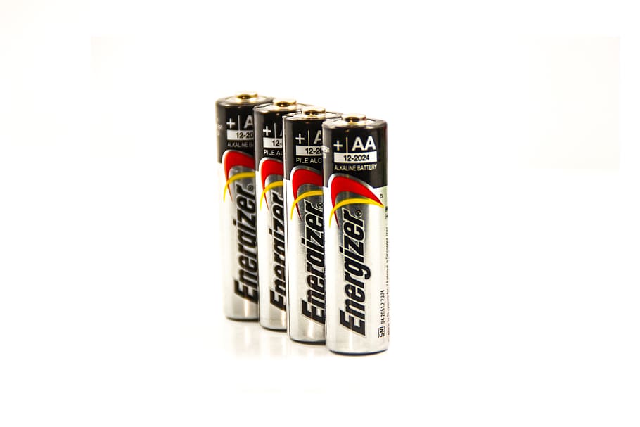 four Energizer batteries, stack, battery, energy, white, white background