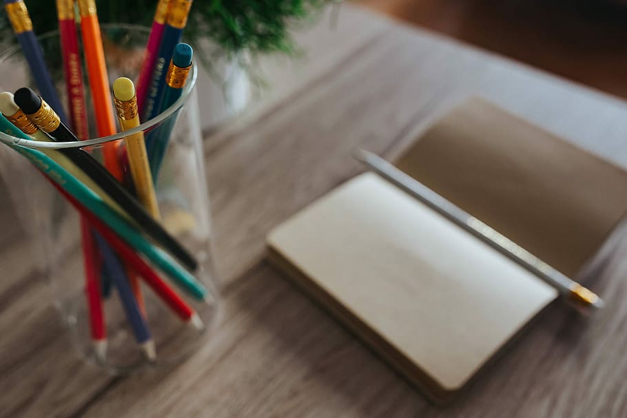 HD wallpaper: Notebooks with colourful pencils on a wooden desk, copy