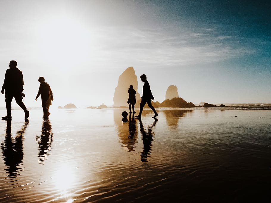 silhouette of people walking body of water, four person walking on body of water near stone HD wallpaper