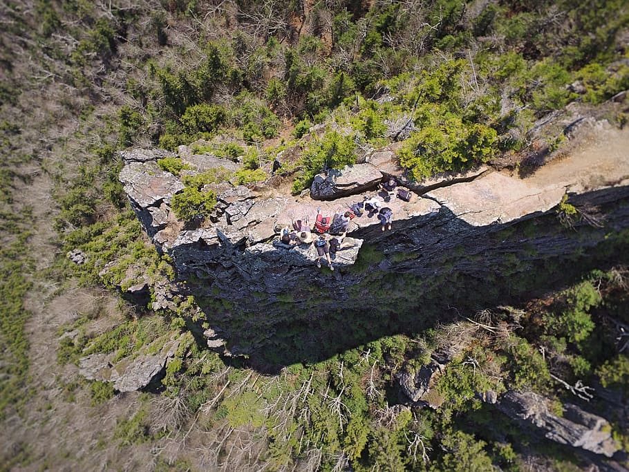 lake in between trees, aerial photography of gray concrete cliff HD wallpaper