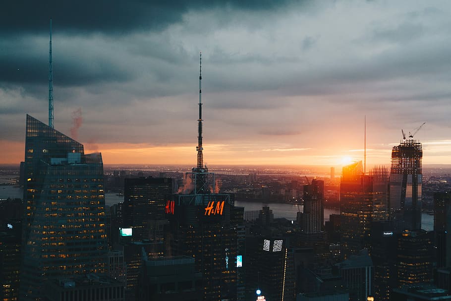 high angle photography of high-rise building, aerial photography of city buildings during sunset HD wallpaper
