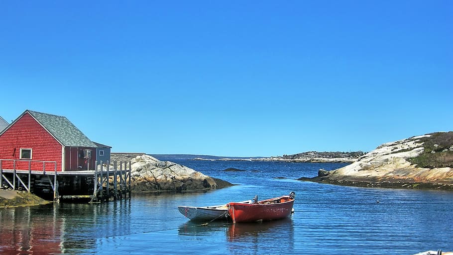 Boat and house landscape in Peggys Cove in Halifax, Canada, photos