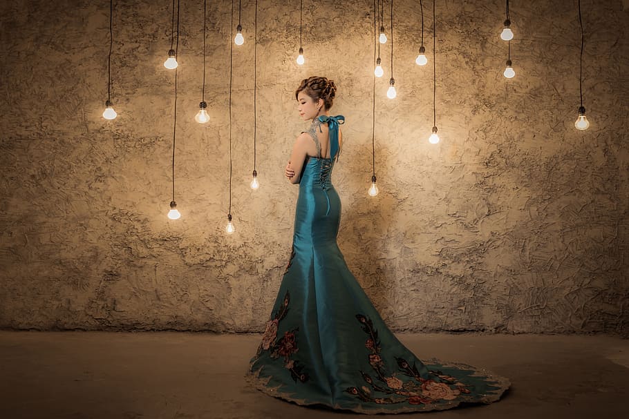 standing woman wearing green sleeveless long dress, light, decoration HD wallpaper