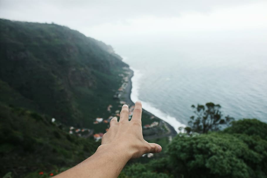 closeup photo of person's left hand, reaching, view, grasp HD wallpaper