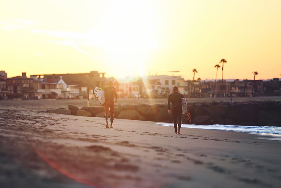sea, ocean, water, waves, nature, sunset, sunrise, people, men HD wallpaper