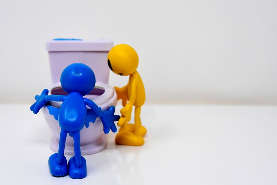 blue and yellow characters standing beside toilet bowl illustration