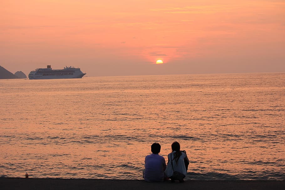 two people sitting on seashore during sunset, ship, lover, sky HD wallpaper