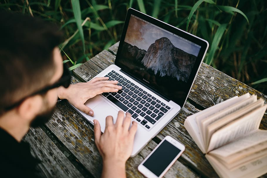 Man working on Macbook at lake, workspace, workplace, computer HD wallpaper