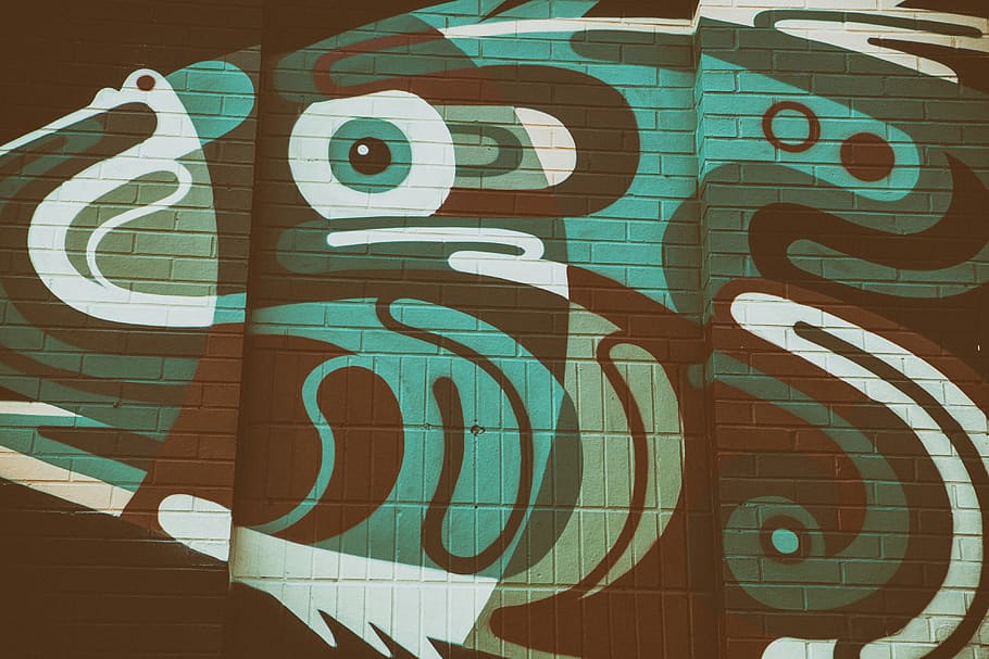 Street art captured on a brick wall in Shoreditch, textures, graffiti
