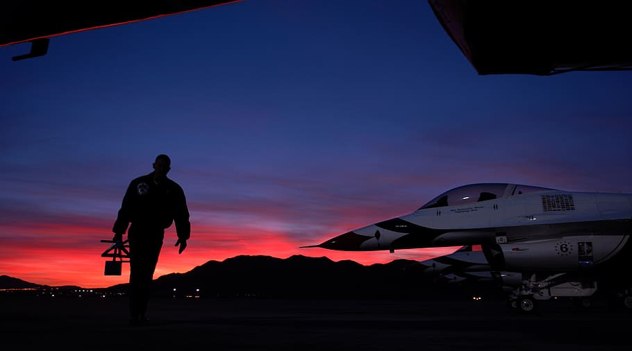 man walking near white aircraft under pale evening sky, military airman, HD wallpaper