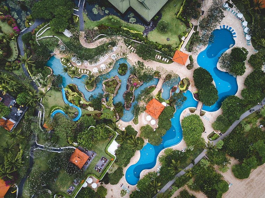 aerial photography of outdoor pool surrounded by houses, aerial view of house with pool HD wallpaper