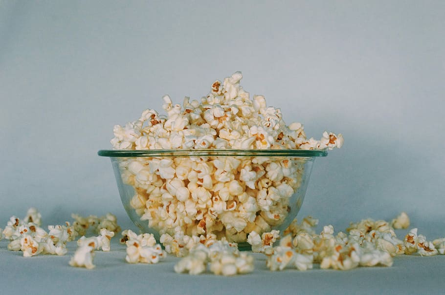 popcorns on clear glass bowl, clear glass bowl with popcorns