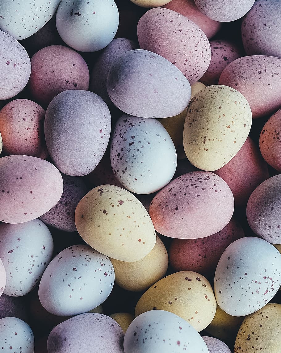 gray, pink, and yellow quail eggs, easter eggs, candy, speckled