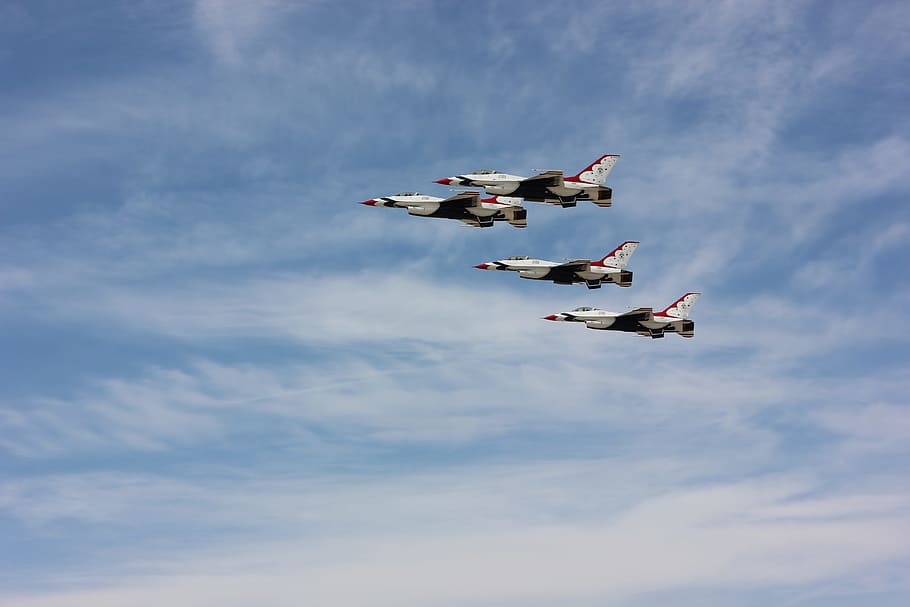 four fighting planes, four white-and-red fighter planes flying in sky HD wallpaper